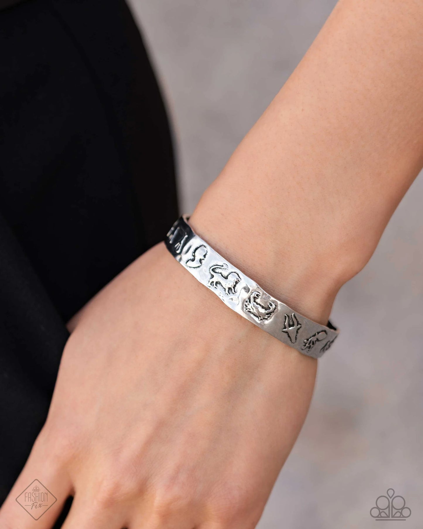 Astrology A-Lister - Silver Zodiac Sign Embossed Paparazzi Cuff Bracelet