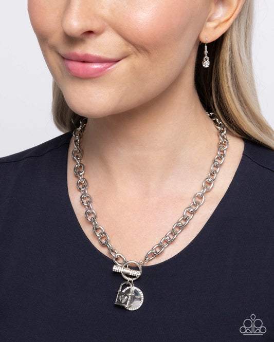 Locked Lady - White Rhinestone Embellished Charms/Silver Chain Paparazzi Necklace & matching earrings