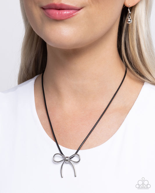 Leisurely Ladylike - Black Textured Cord/Silver Bow Pendant Paparazzi Necklace & matching earrings