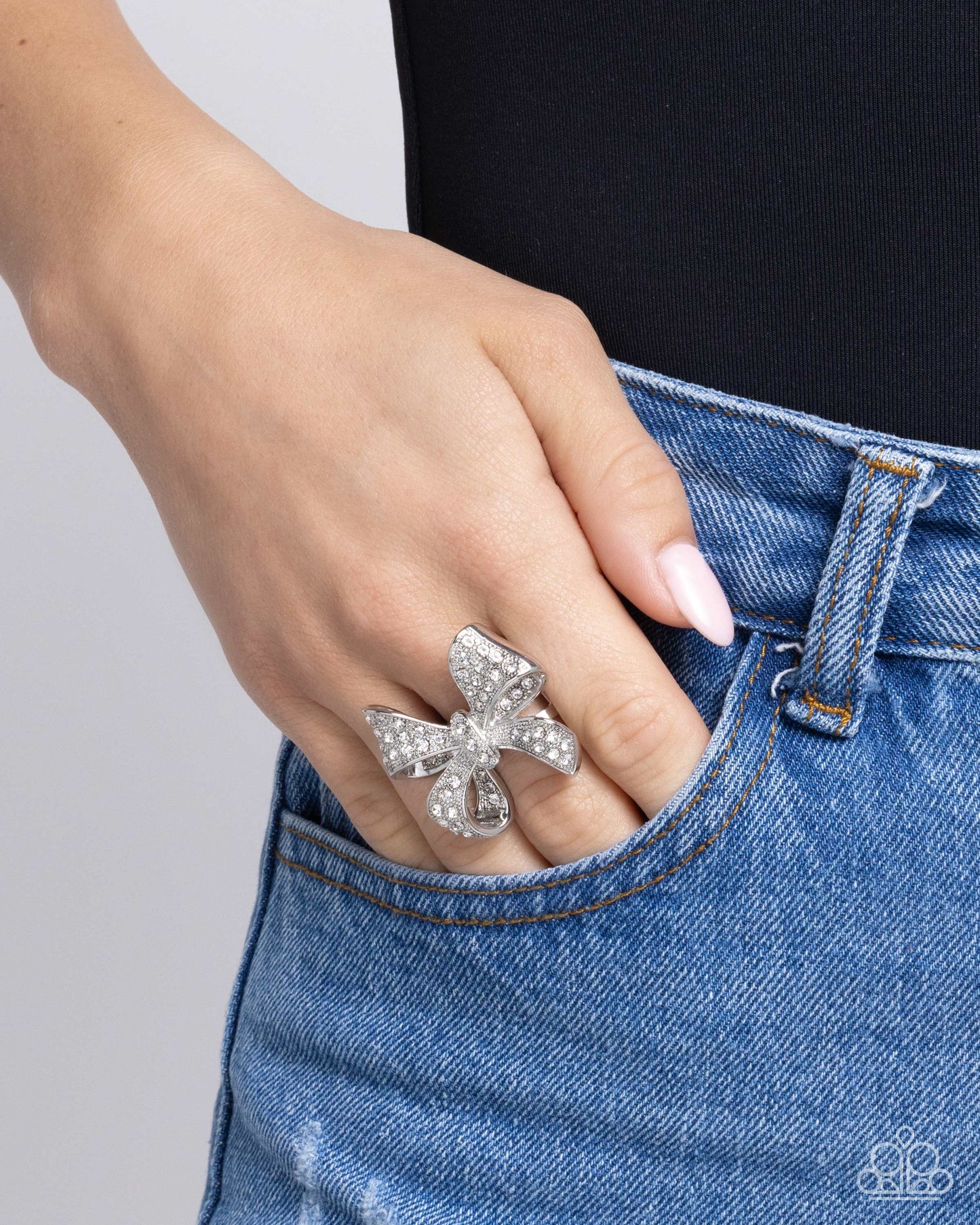 Sweetheart Souvenir - White Rhinestone Embellished Silver Bow Paparazzi Ring