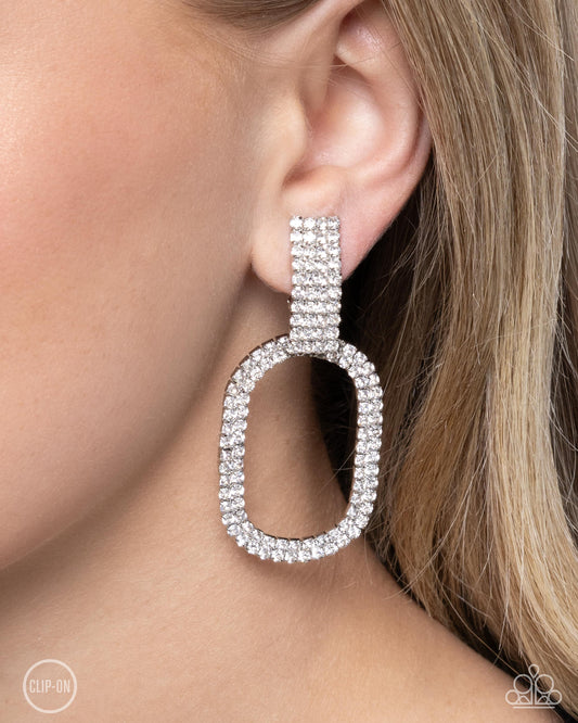 Guarded Glitz - White Rhinestone Embellished Paparazzi CLIP-ON Earrings