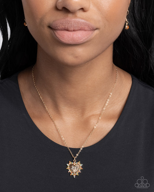 Joy to the World - Gold Oversized Heart/ Silver "Joy"/Multicolored Rhinestone Pendant Paparazzi Necklace & matching earrings