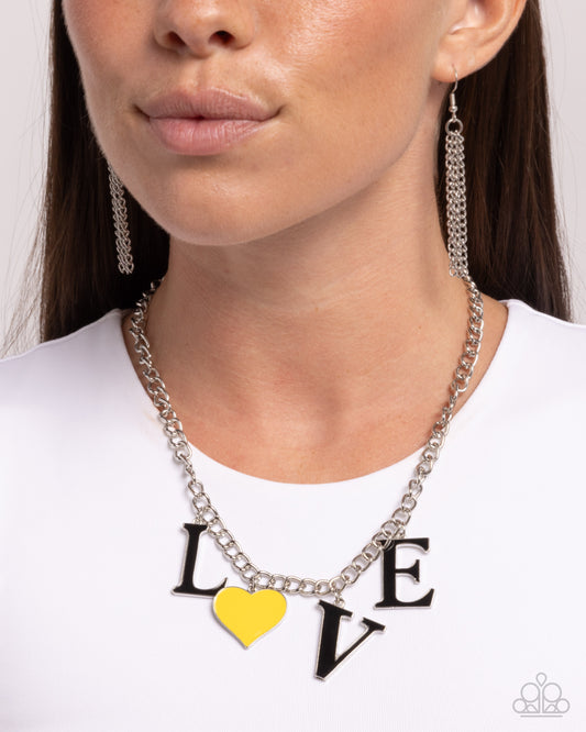 Lovely Lineup - Yellow Heart "o"/Black Metal "LVE" Paparazzi Necklace & matching earrings