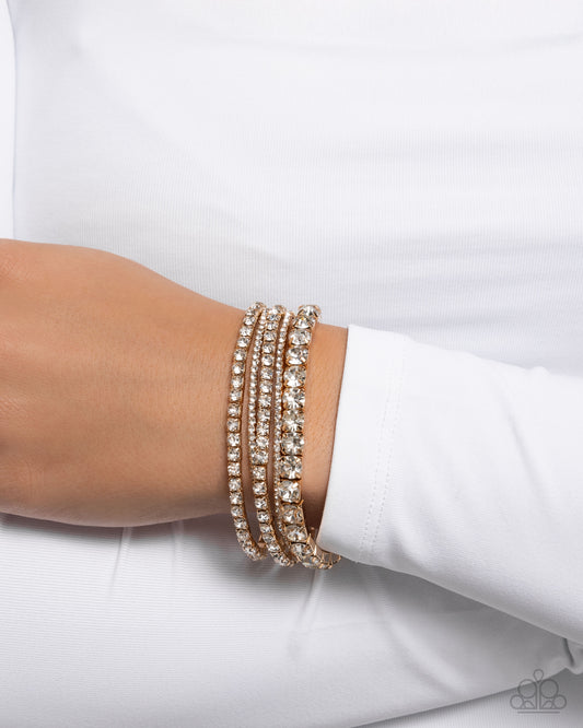 Persistent Pizzazz - Gold & White Rhinestone Set of 5 Paparazzi Stretch Bracelets