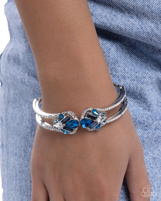 Cosmopolitan Catwalk - Blue Gems & White Rhinestones Paparazzi Hinge Bracelet