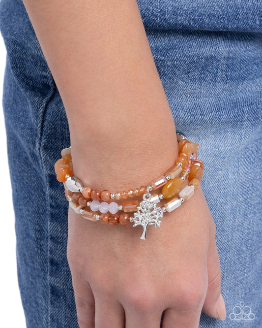 Capricious Collision - Orange Chiseled Stones, Silver Accents, Silver Tree Charm Paparazzi Coil Bracelet