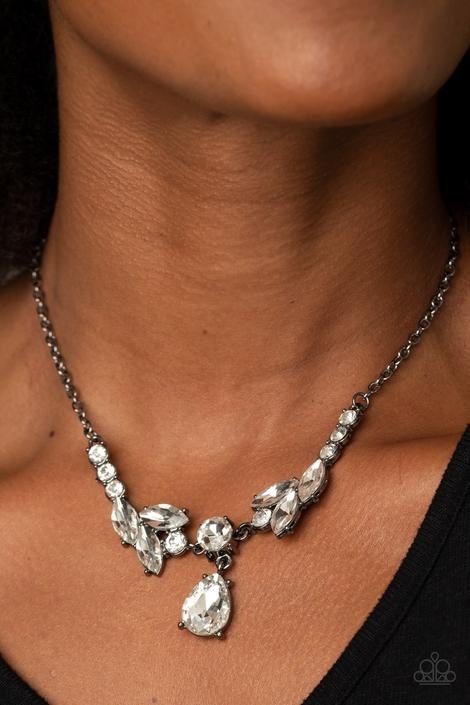 Unrivaled Sparkle - Gunmetal Rhinestone Encrusted Frames/Oversized White Teardrop Rhinestone Pendant Paparazzi Necklace & matching earrings