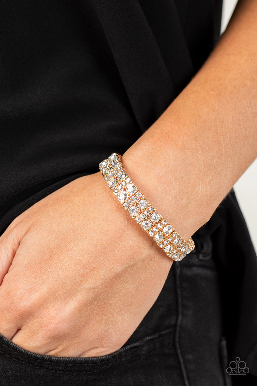 Mic Dropping Drama - Gold & White Rhinestone Paparazzi Stretch Bracelet