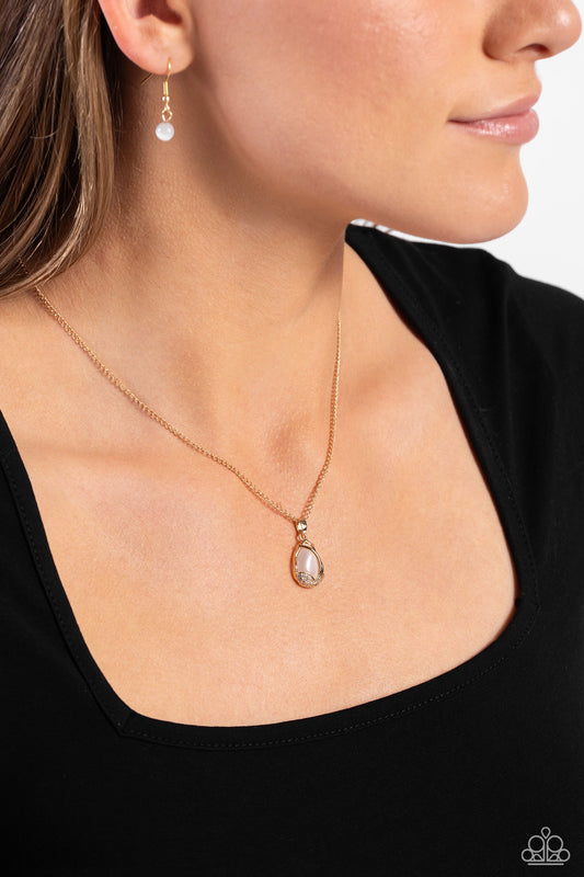 Top-Notch Trinket - GoldLeafy Frames/White Cat's Eye Stone Pendant Paparazzi Necklace & matching earrings