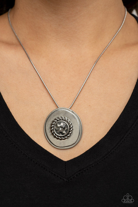 Make Me a MEDALLION-aire - Silver Asymmetrical Disc/Smoky Rhinestone Pendant Paparazzi Necklace & matching earrings