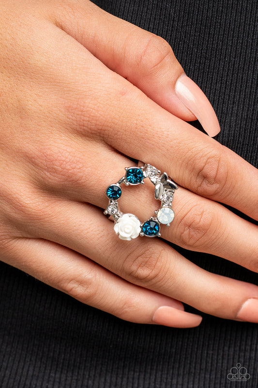 Butterfly Bustle - Blue, Opal, & White Rhinestones/White Rosebud/Silver Butterfly Paparazzi Ring
