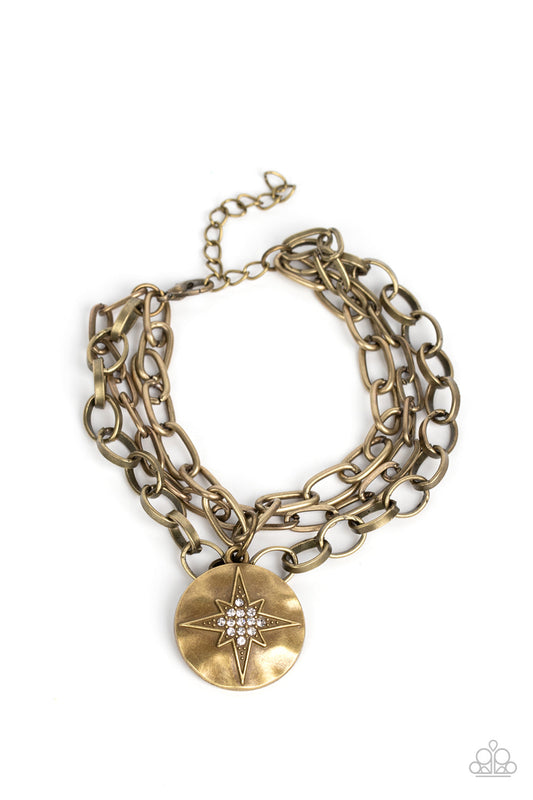 True North Twinkle - Brass Hammered Disc, White Rhinestones, & Brass Star Paparazzi Adjustable Bracelet