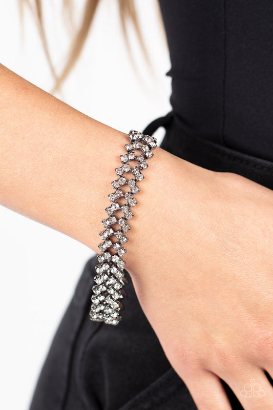 Seize the Sizzle - Gunmetal Frame & White Rhinestone Haphazard Stack Paparazzi Adjustable Bracelet