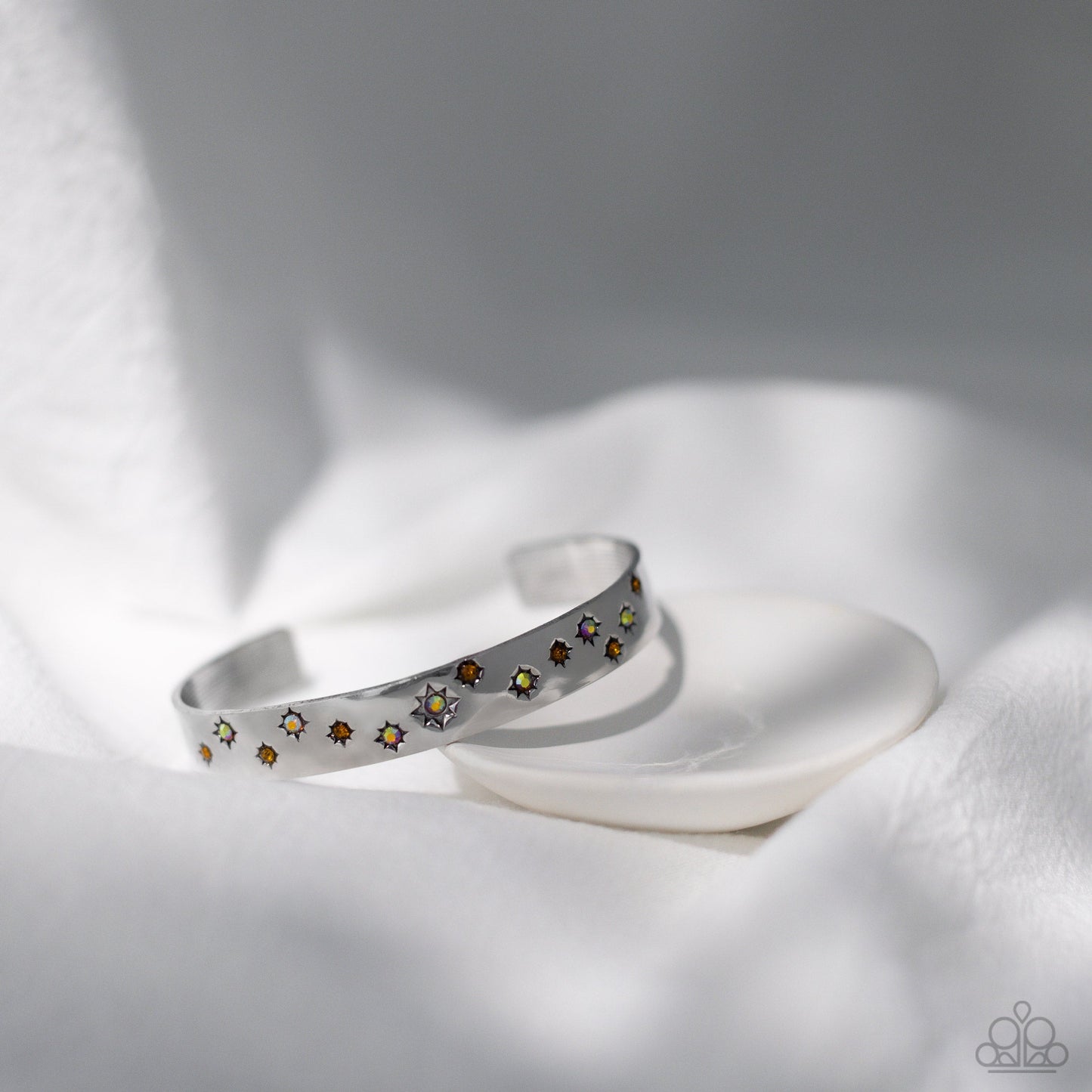 Starburst Shimmer - Orange & Iridescent Dainty Rhinestones/Stamped Star Shape Paparazzi Cuff Bracelet