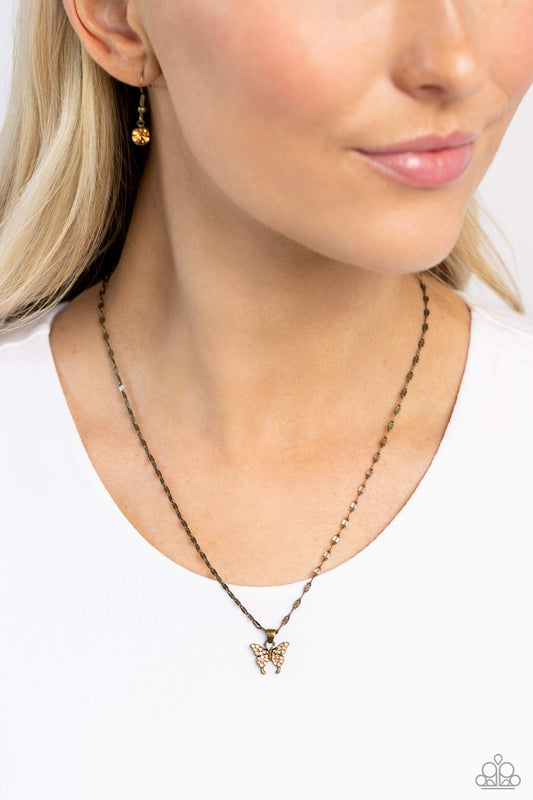 High-Flying Hangout - Brass/Aurum Rhinestone Encrusted Butterfly Paparazzi Necklace & matching earrings