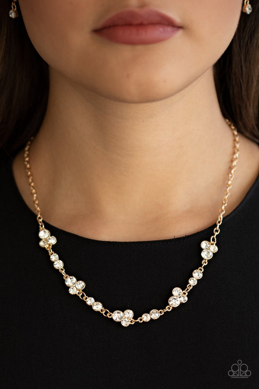 Gorgeously Glistening - Gold/White Rhinestone Paparazzi Necklace & matching earrings
