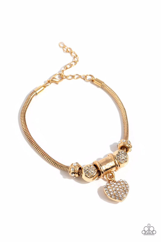 Suitor Sequence - Gold Beads/White Rhinestone Heart Charm Paparazzi Adjustable Bracelet