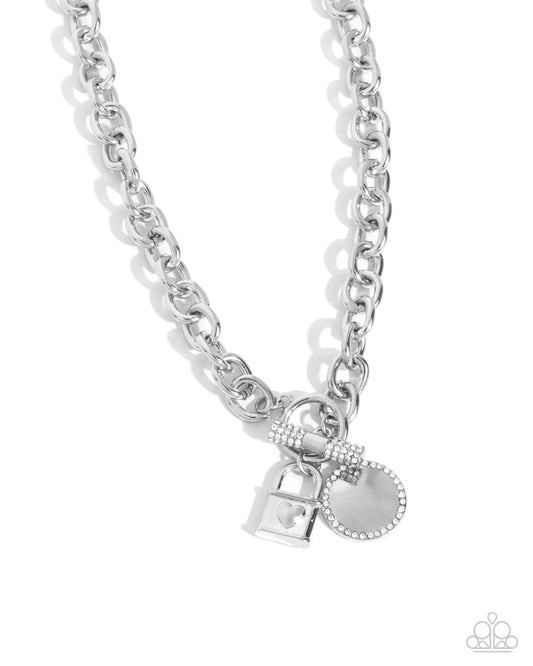 Locked Lady - White Rhinestone Embellished Charms/Silver Chain Paparazzi Necklace & matching earrings