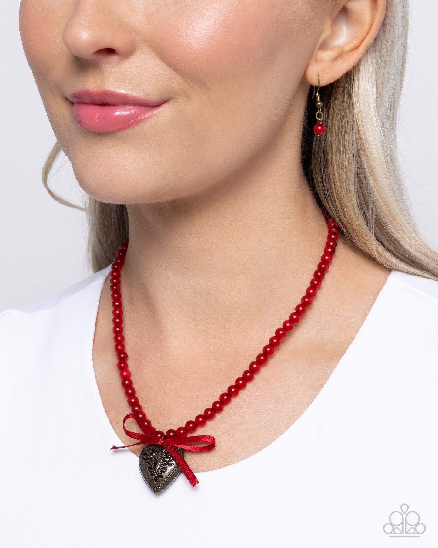 Tasteful Trimming - Red Acrylic Beads/Red Bow/Brass Heart Pendant Paparazzi Necklace & matching earrings