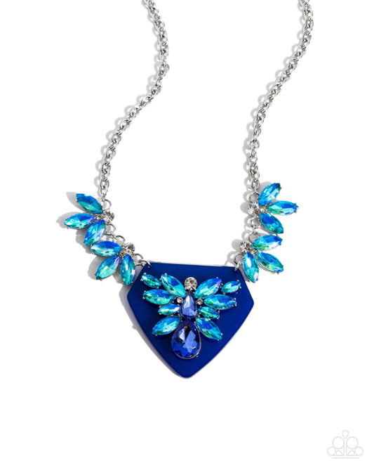 Scintillating Shield - Blue Triangular Pendant/Blue Rhinestones Paparazzi Necklace & matching earrings