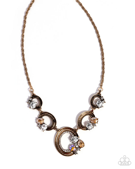Polished Perch - Gold Antiqued Rings/Multicolored Rhinestones Paparazzi Necklace & matching earrings