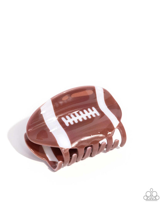 Touchdown Tale - Brown & White Acrylic Football Paparazzi Hair Claw Clip
