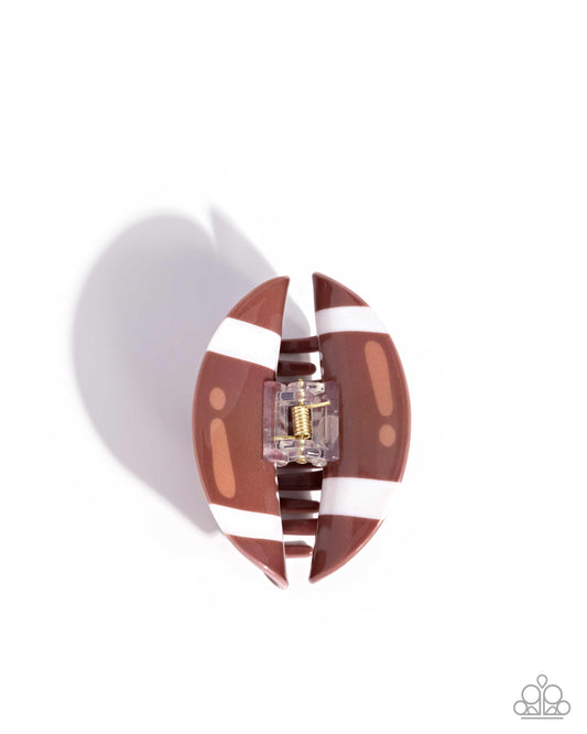 Touchdown Tale - Brown & White Acrylic Football Paparazzi Hair Claw Clip