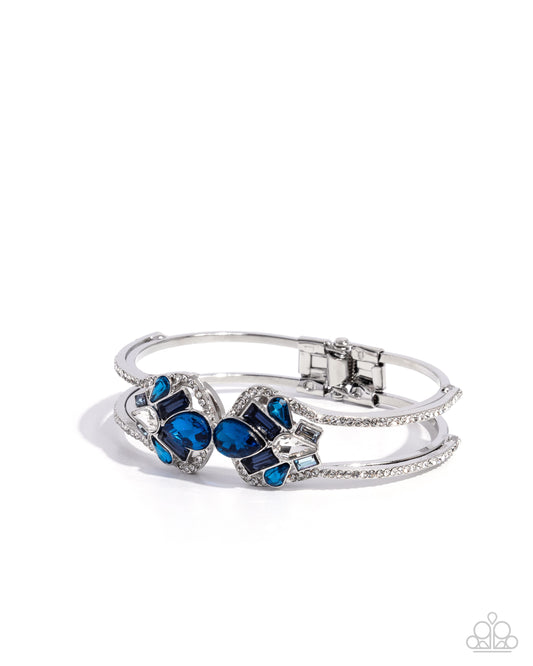 Cosmopolitan Catwalk - Blue Gems & White Rhinestones Paparazzi Hinge Bracelet
