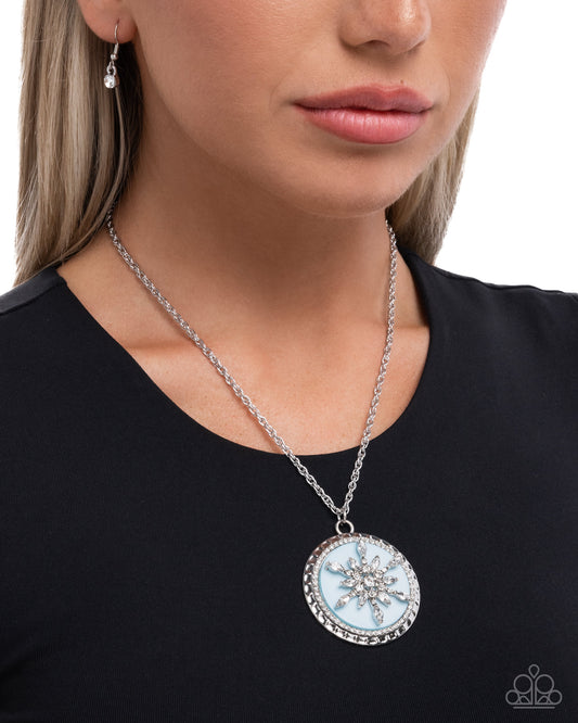 Snowflake Story - Blue Backdrop/White Rhinestone Snowflake Pendant Paparazzi Necklace & matching earrings