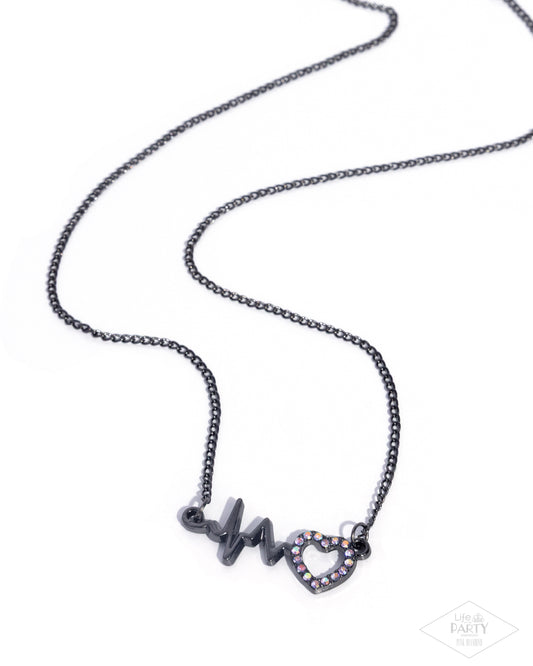 HEARTBEAT Street - Purple Rhinestone Embellished Heart/Gunmetal Wavy Bar Paparazzi Necklace & matching earrings