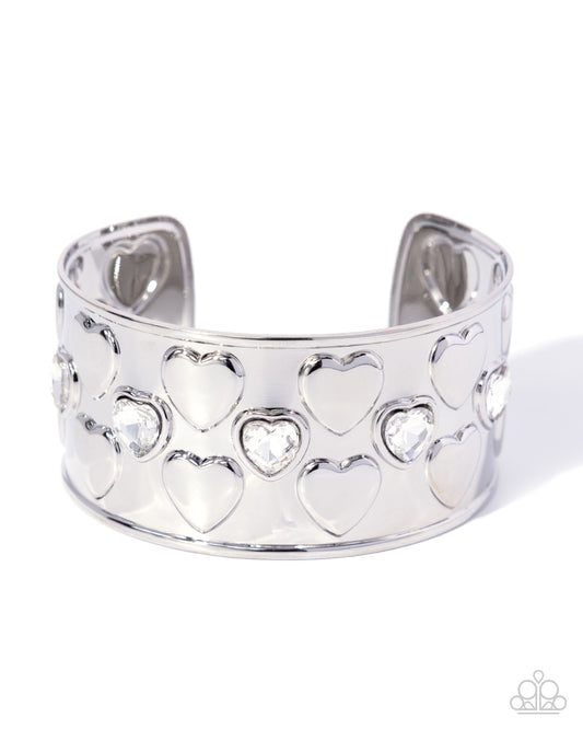 Loveable Labor - White Gem Hearts/Silver Heart Embossed Cuff Paparazzi Bracelet
