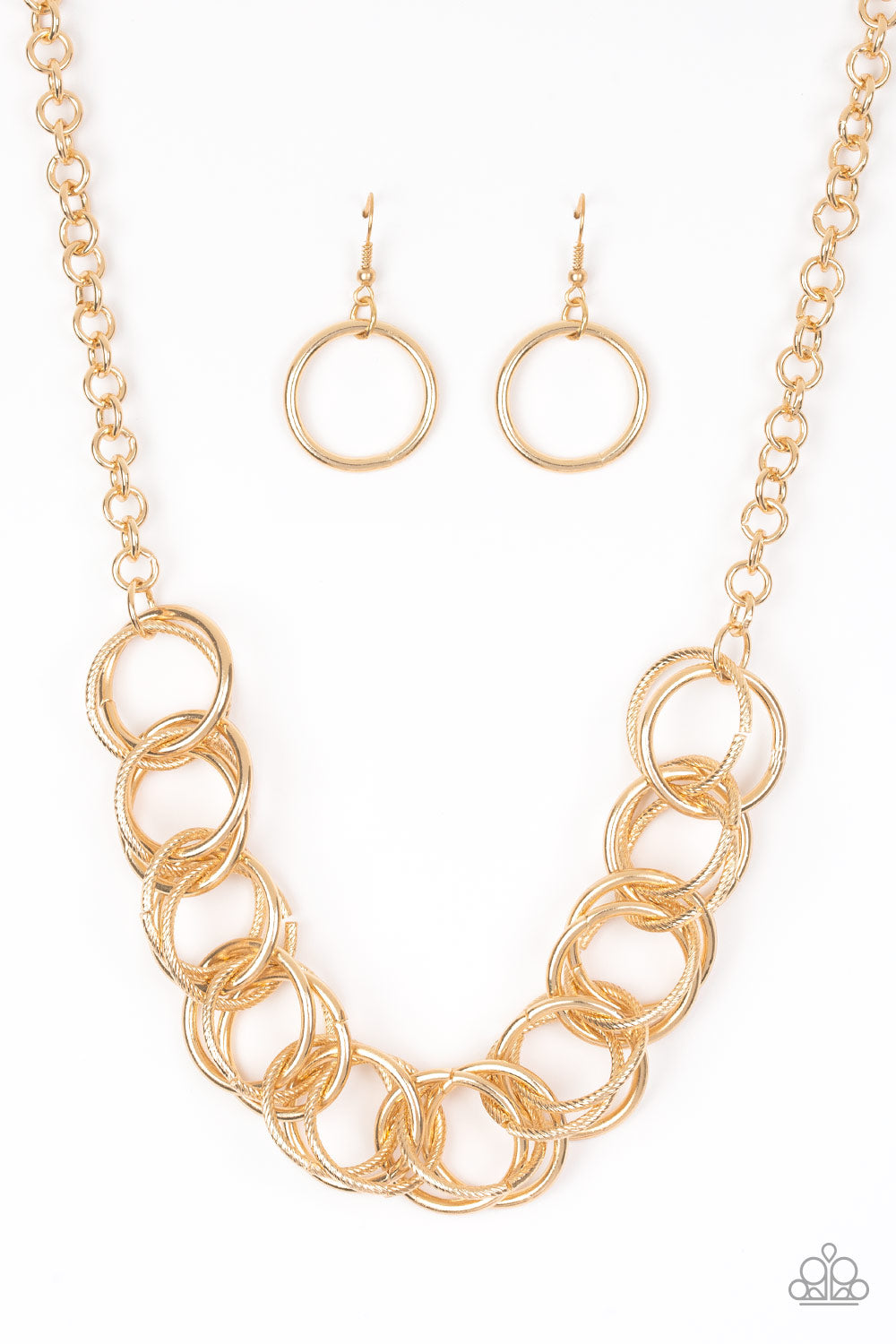 Heavy Metal Hero - Gold Smooth & Serrated Interlocking Rings Paparazzi Necklace & matching earrings