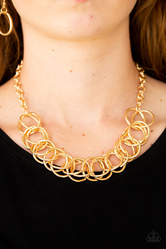 Heavy Metal Hero - Gold Smooth & Serrated Interlocking Rings Paparazzi Necklace & matching earrings