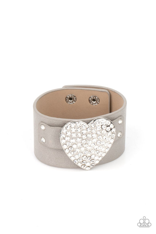 Flauntable Flirt - Silver/Gray Leather Band & White Rhinestone Oversized Heart Paparazzi Snap Bracelet