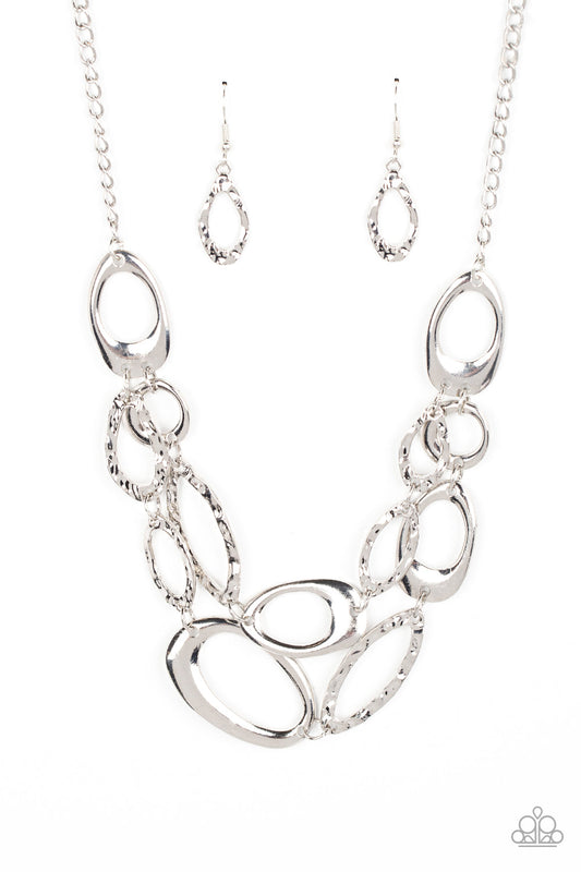 Game OVAL - Silver Asymmetrical & Hammered Oval Paparazzi Necklace & matching earrings
