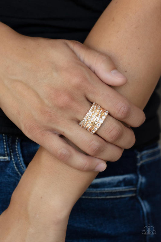 Exclusive Elegance - Gold Bands & Mismatched White Rhinestone Criss Cross Pattern Paparazzi Ring