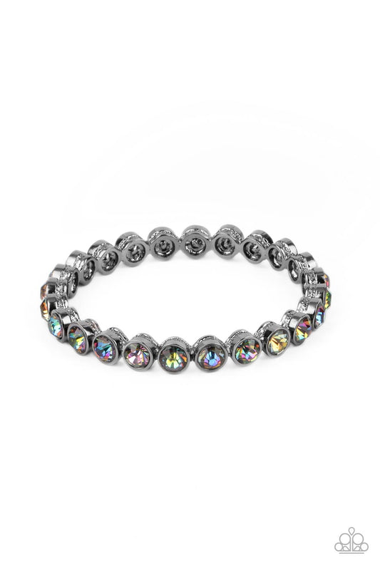 Presto Posh - Multi Oil Spill Rhinestone Encrusted Paparazzi Bangle Bracelet