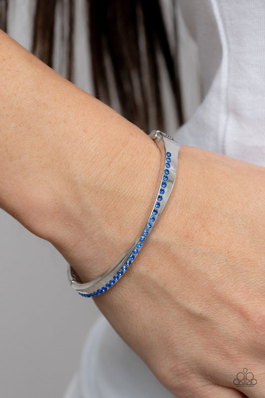 Palace Penthouse - Blue Dainty Rhinestones & Asymmetrical Silver Frame Paparazzi Hinge Bracelet