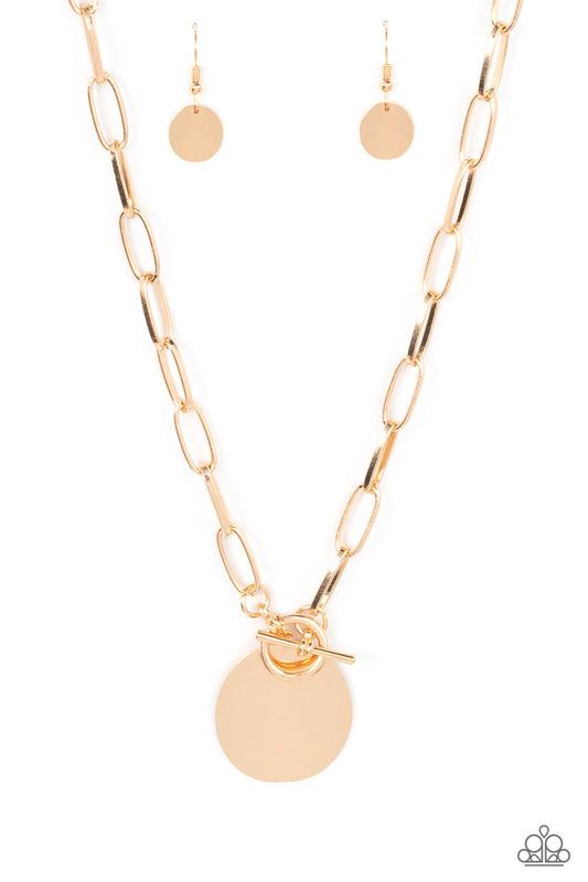 Tag Out - Gold Oversized Oval Disc/Gold Chain Paparazzi Toggle Necklace