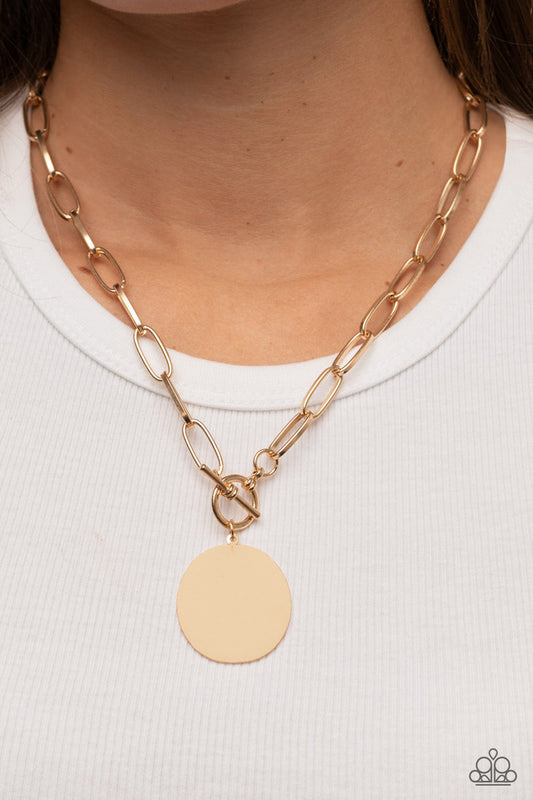 Tag Out - Gold Oversized Oval Disc/Gold Chain Paparazzi Toggle Necklace