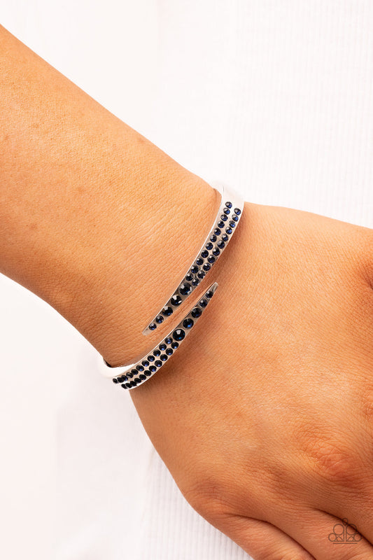 Sideswiping Shimmer - Blue Rhinestones & Silver Bar Paparazzi Hinge Bracelet