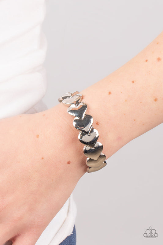 Hearts Galore - Silver Oversized Overlapping Heart Paparazzi Cuff Bracelet