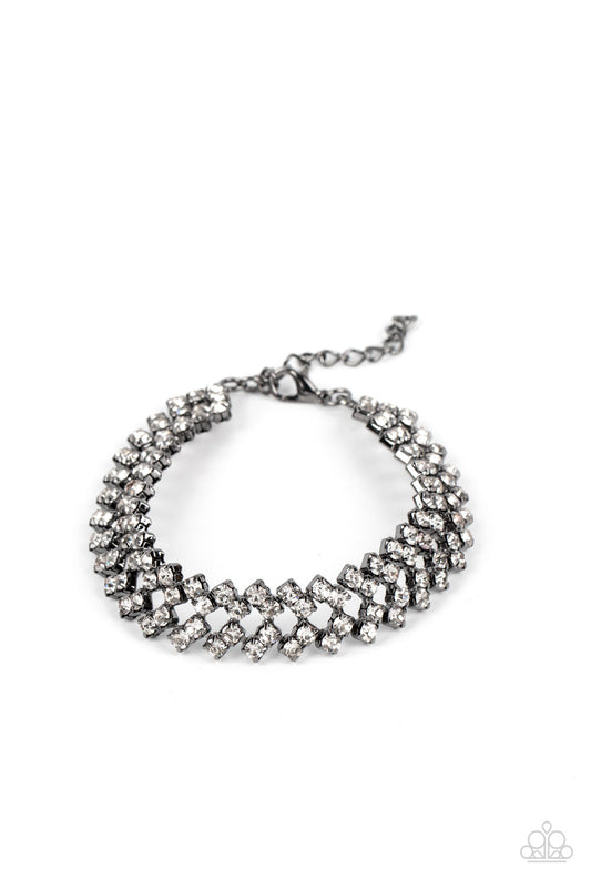 Seize the Sizzle - Gunmetal Frame & White Rhinestone Haphazard Stack Paparazzi Adjustable Bracelet