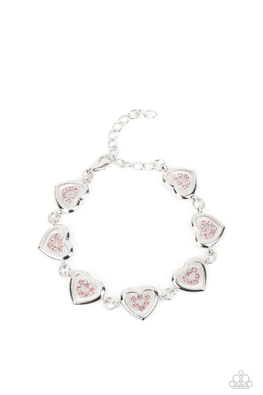 Catching Feelings - Pink Rhinestones & Silver Heart Silhouettes Paparazzi Adjustable Bracelet