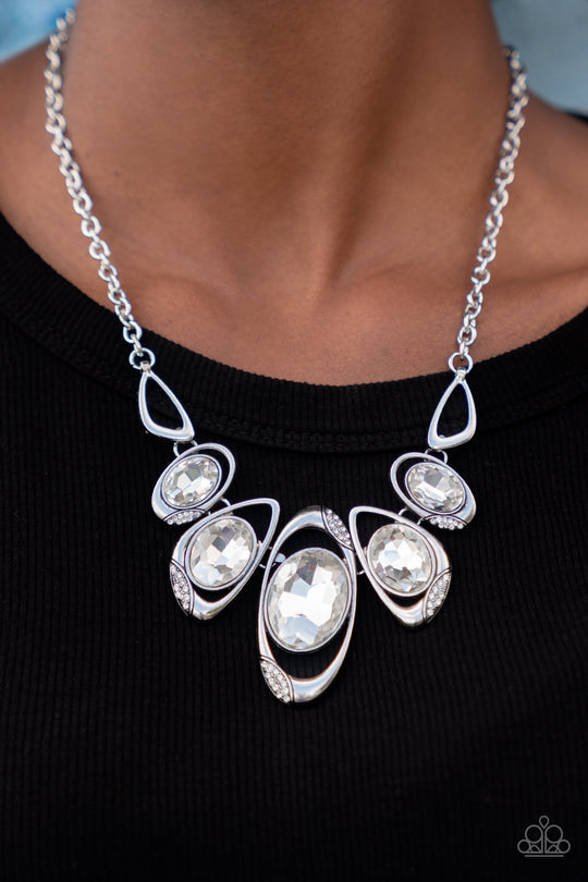 Hypnotic Twinkle - White Rhinestones and Asymmetrical Silver Frame Paparazzi Necklace & matching earrings